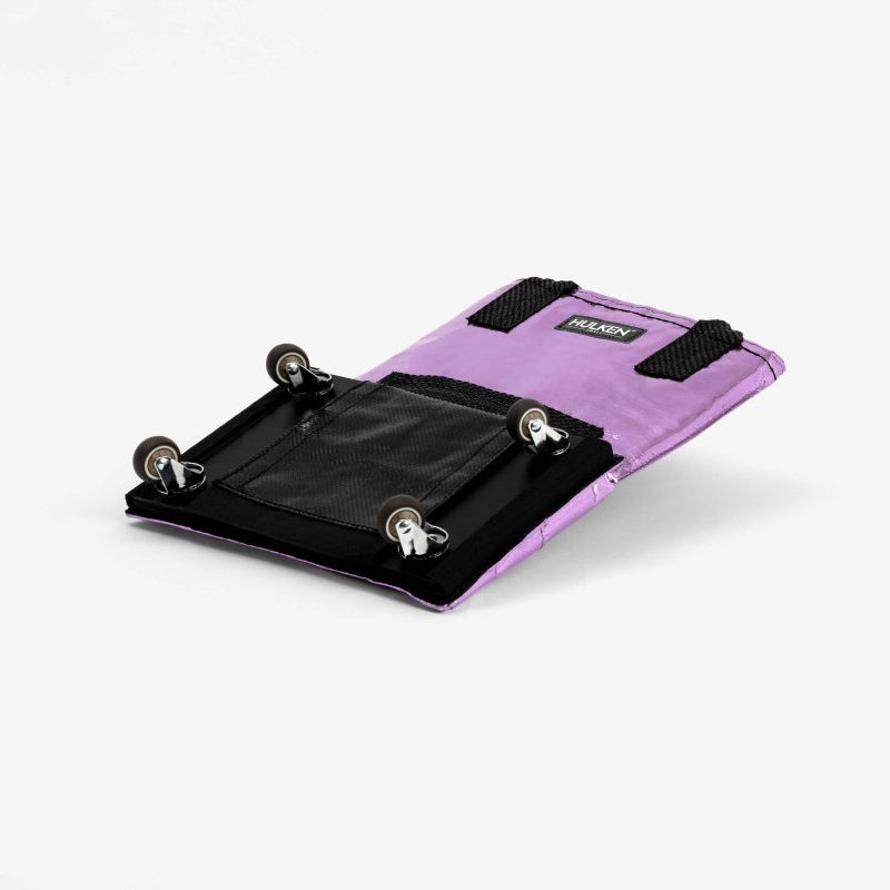 Small Hulken Bag in lilac color with a compact design, featuring a top handle and sleek style.