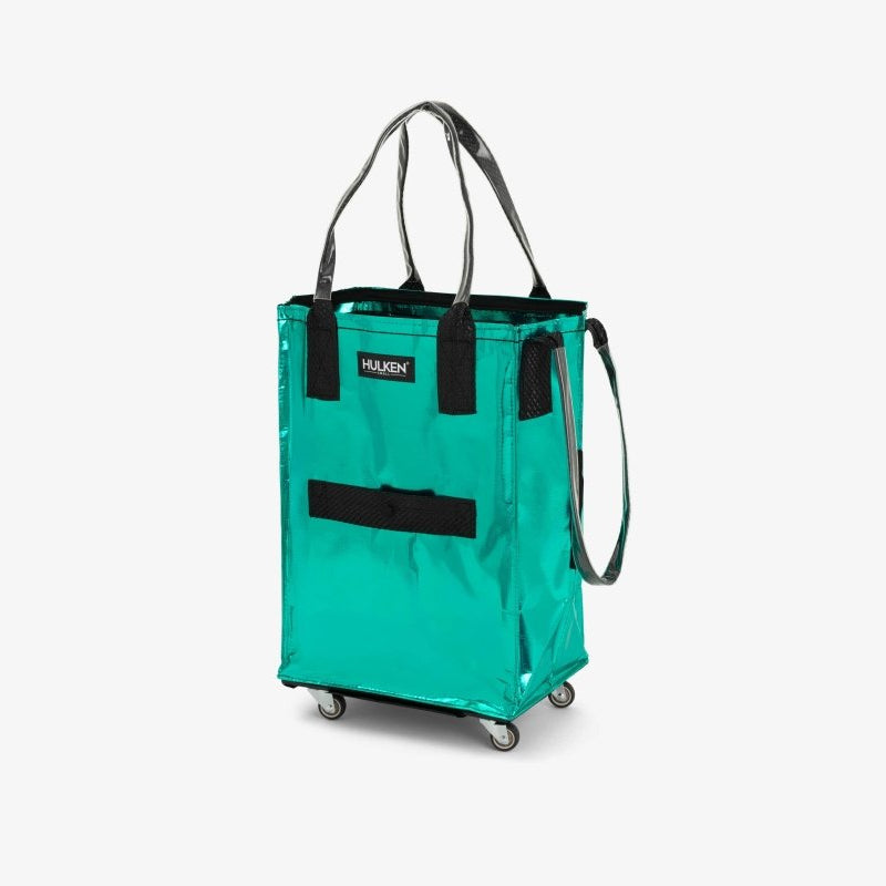 Small Hulken teal bag with adjustable strap and zipper closure, featuring a sleek, compact design ideal for everyday use.