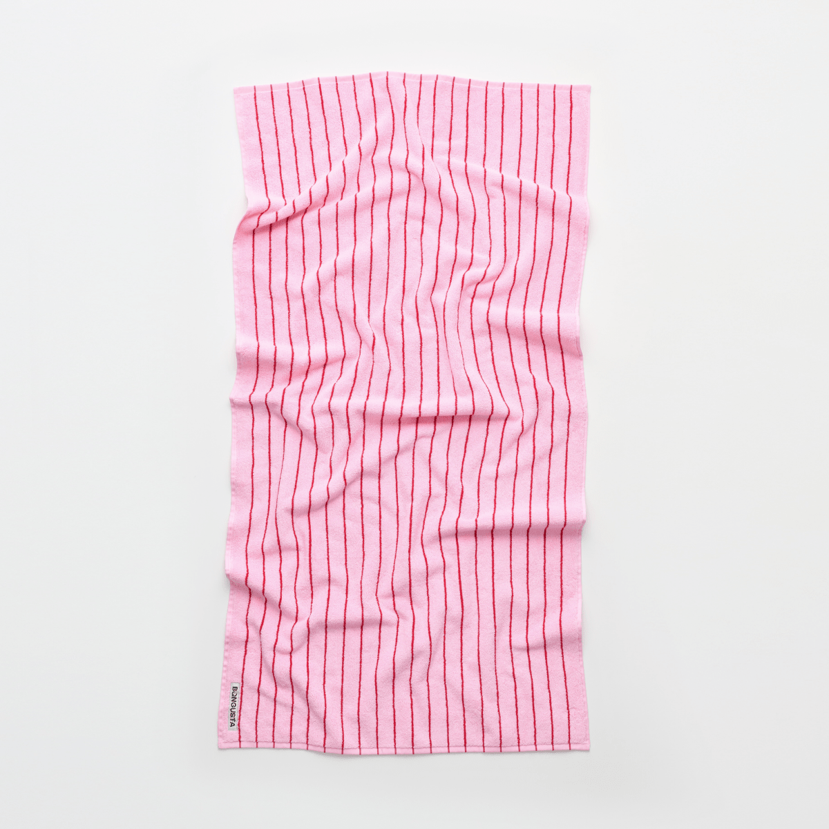 Bongusta Naram bathroom towel in baby pink and Ski Patrol colors, soft and absorbent for everyday use.