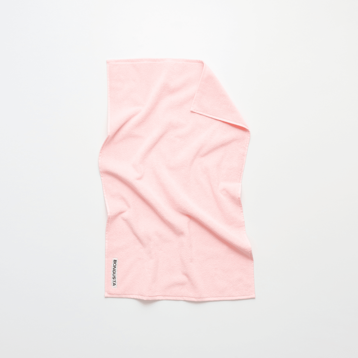 Bongusta Naram blush bathroom towel, soft and plush hand towel with a gentle pink hue, displayed on a neutral background.