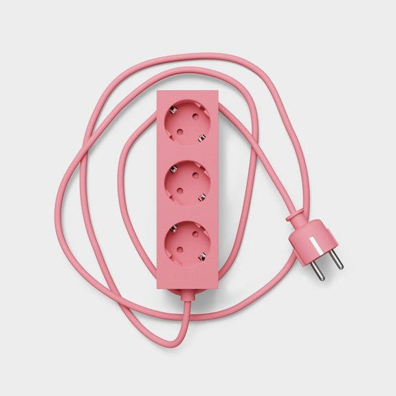 Pedestal Power Strip with 5-meter cord and 3 sockets, in bubble gum color, providing versatile electrical outlet extension.