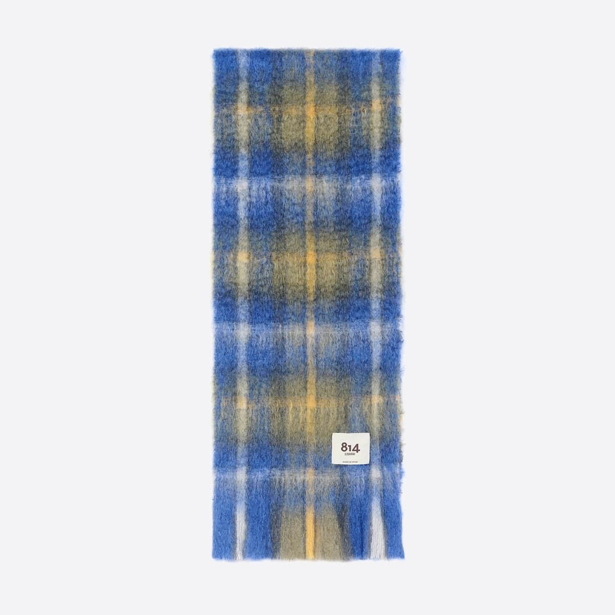 Light blue tartan mohair scarf from 814 Ezcaray, showcasing soft, cozy woolen fabric and classic plaid pattern.