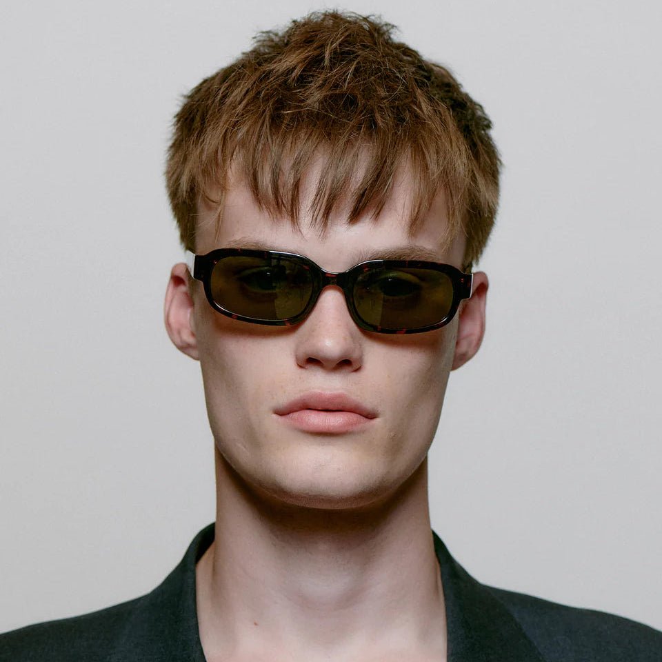 A. Kjaerbede Will sunglasses with dark tinted lenses and sleek black frame, stylish eyewear for everyday wear.