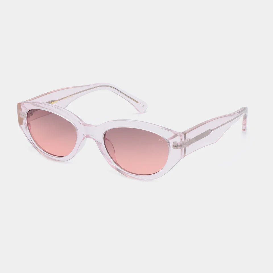 A. Kjaerbede Winnie sunglasses with round tinted lenses and thin metal frames, stylish eyewear for sun protection.