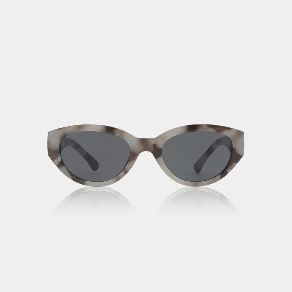 A. Kjaerbede Winnie sunglasses with round frames and dark tinted lenses, stylish eyewear for sun protection.