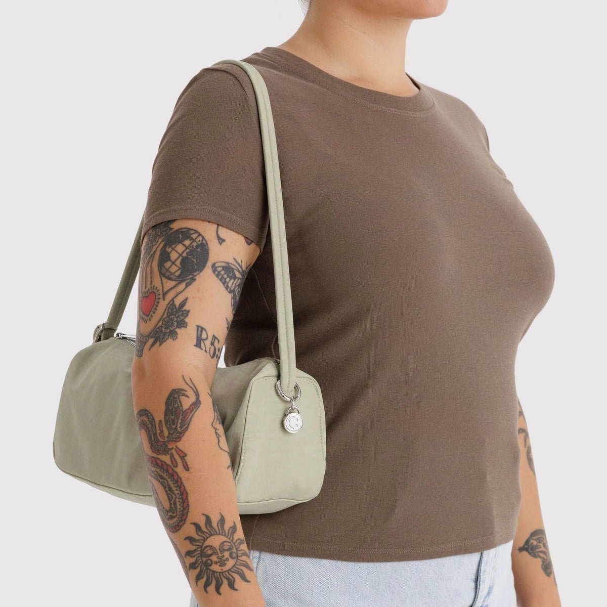 Baggu nylon loaf bag in black with rounded handles and spacious interior, ideal for casual carrying and everyday use.