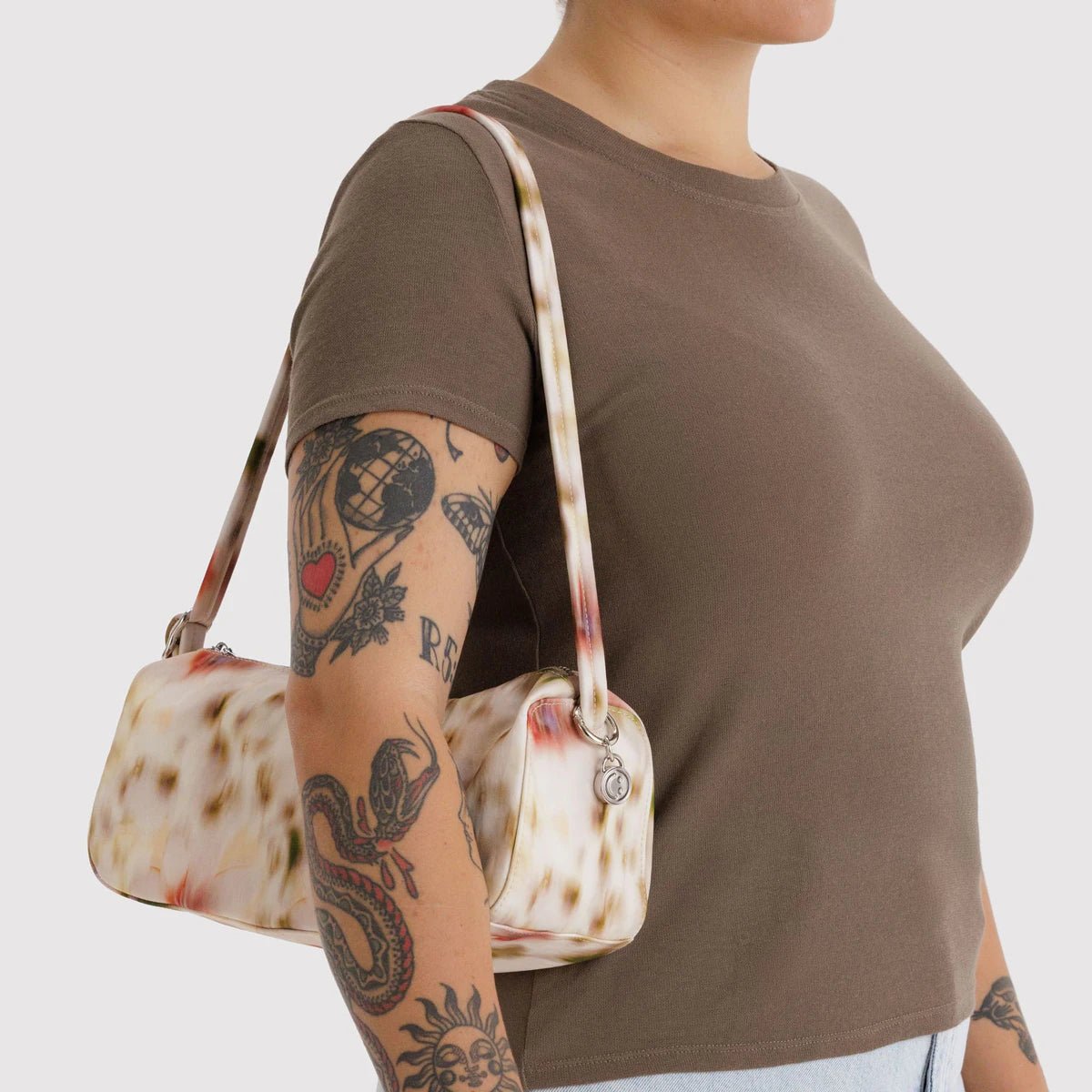 Nylon loaf bag by Baggu with a sleek, minimalist design and durable nylon material, shown in a neutral color.