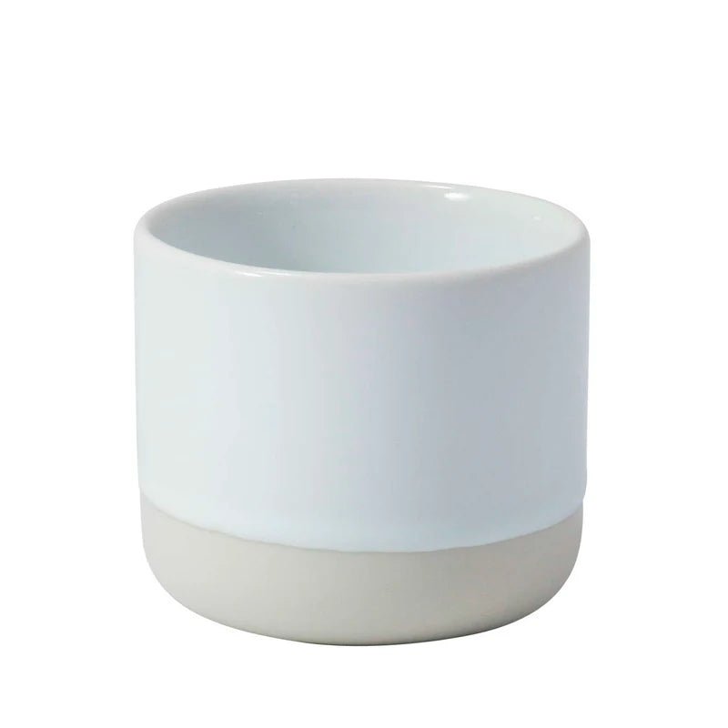 White ceramic Quench Cup by Studio Arhoj featuring a smooth, glossy finish and simple classic design.