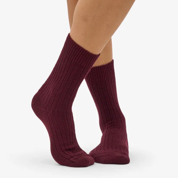 Colorful Standard Merino wool blend socks with vibrant multicolor stripes, soft and comfortable for everyday wear.