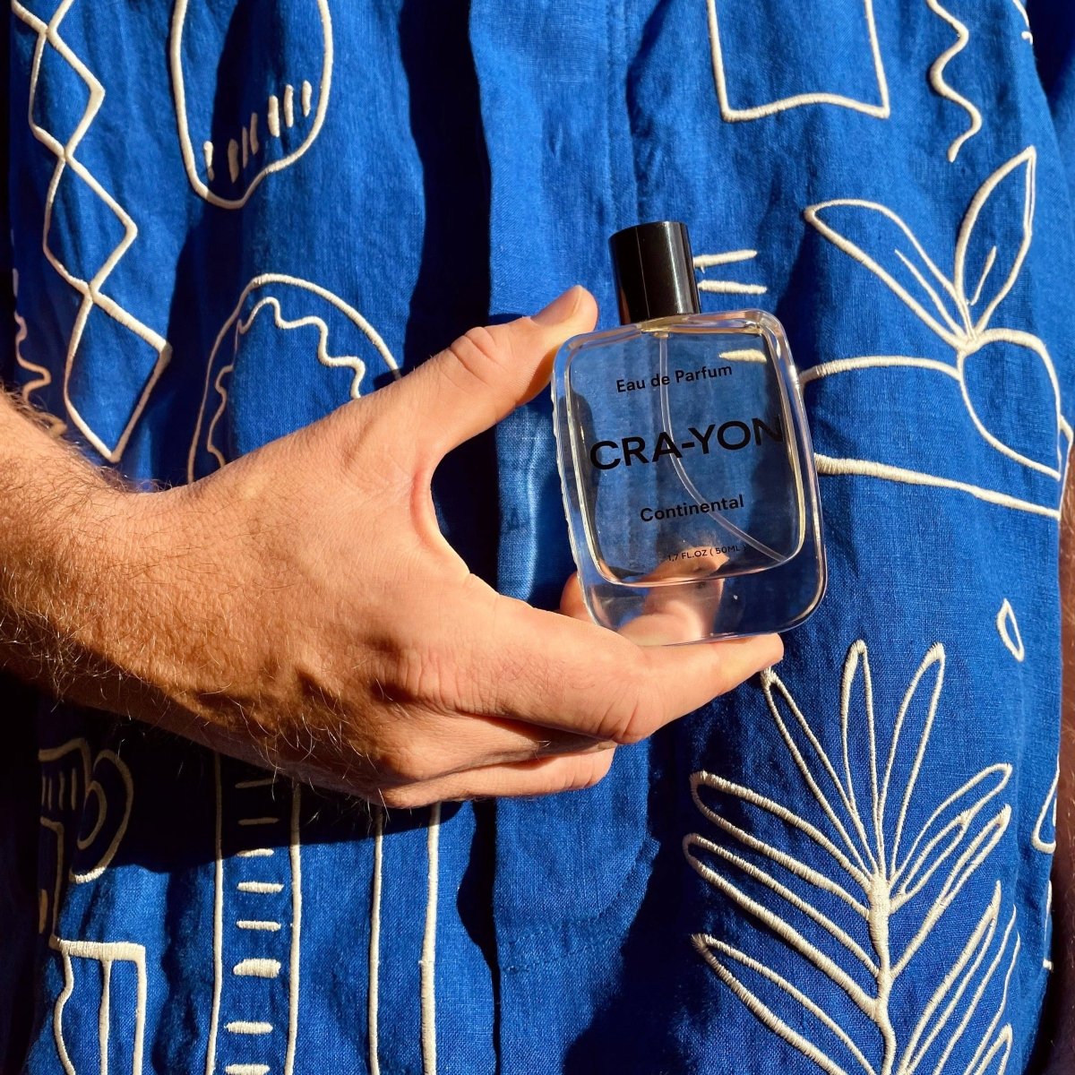 Continental Eau de Parfum by CRA-YON, 50ml perfume bottle with elegant glass design and silver cap.