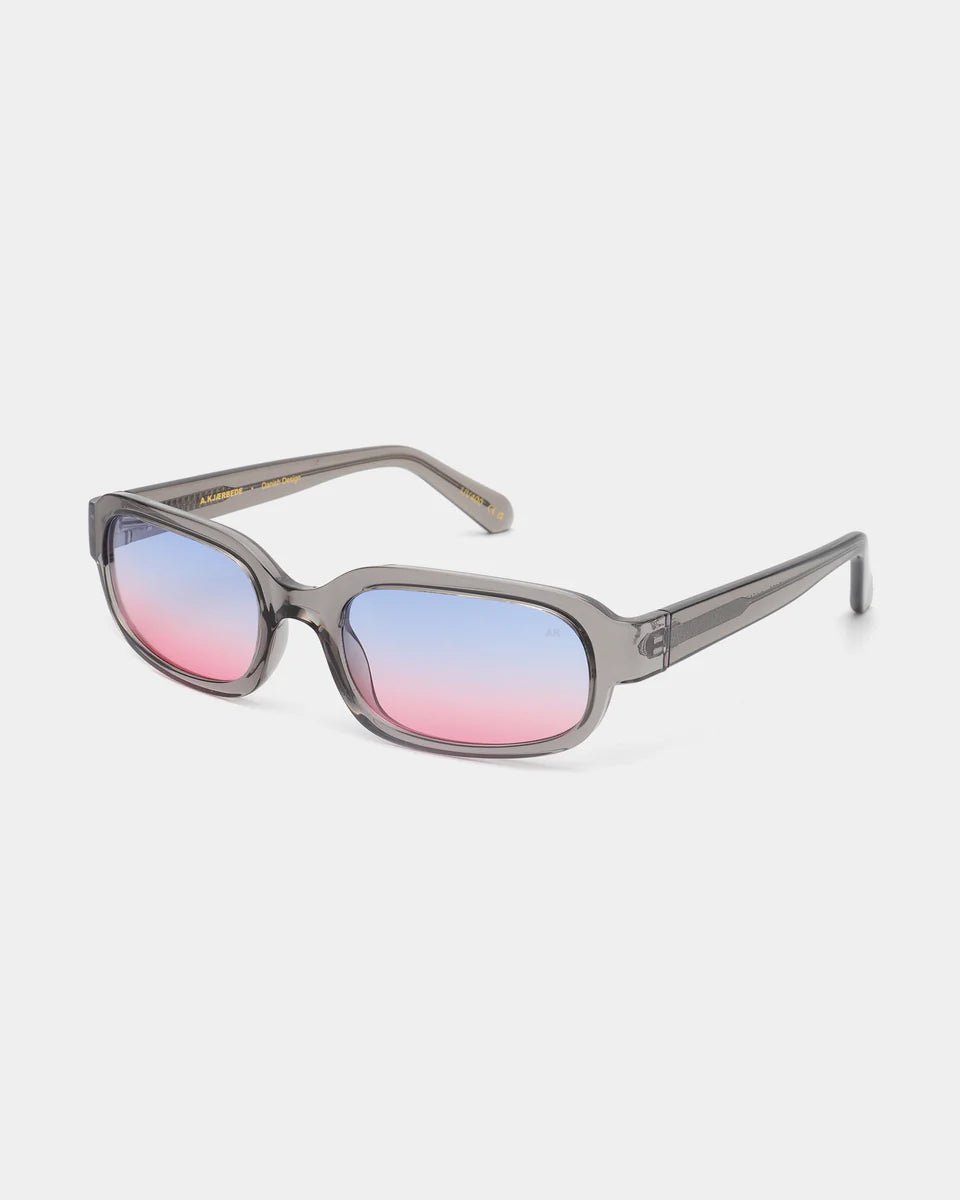 Grey transparent Will sunglasses by A. Kjaerbede with sleek, modern frames and tinted lenses, perfect for stylish sun protection.