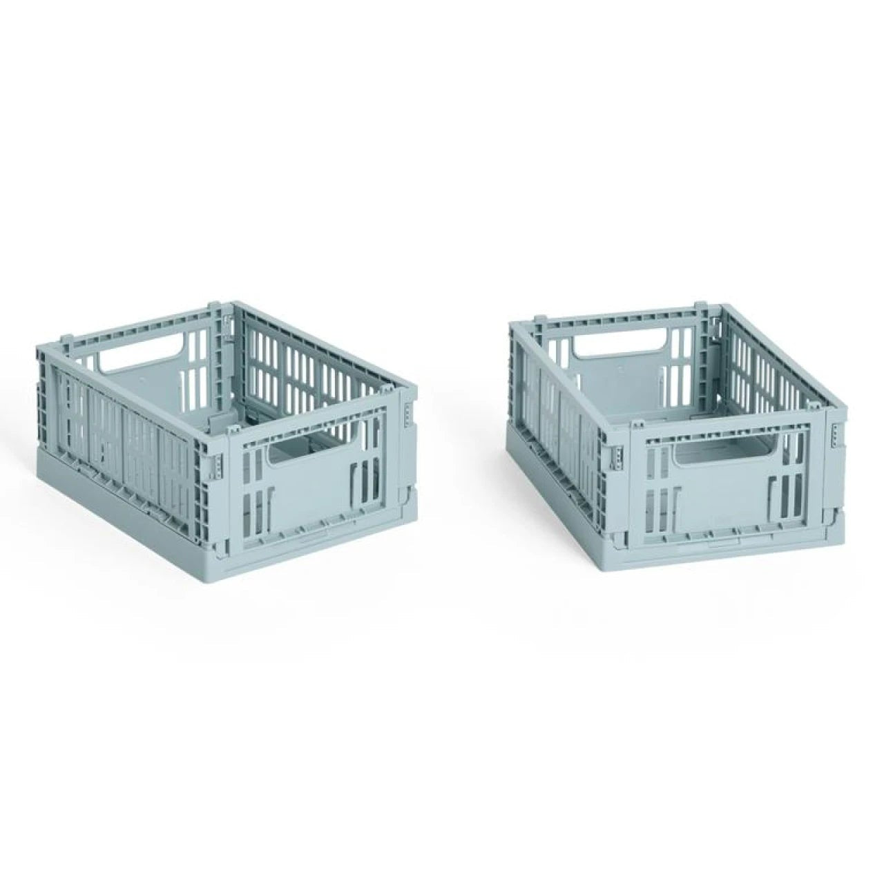 Pair of HAY Mini Colour Crate storage organizers in bright colors for versatile home or office organization.