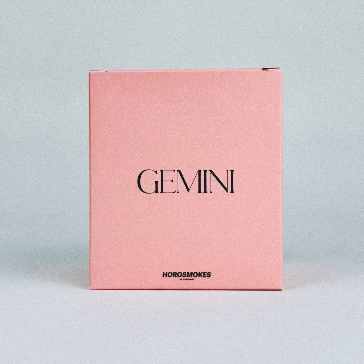 Horosoaps Horosmokes Gemini candle with zodiac-themed design in a glass jar, perfect for astrology-inspired home decor.