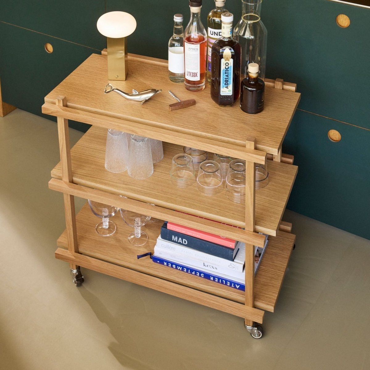 Natural Crayon Trolley by Hübsch, a wooden furniture piece with multiple compartments on wheels for easy storage and mobility.