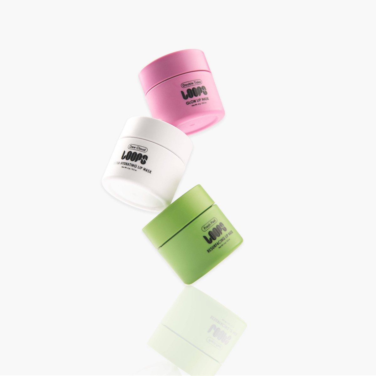 LOOPS Double Take Mini Lip Mask in a small jar, designed to hydrate and nourish lips with a smooth, glossy finish.
