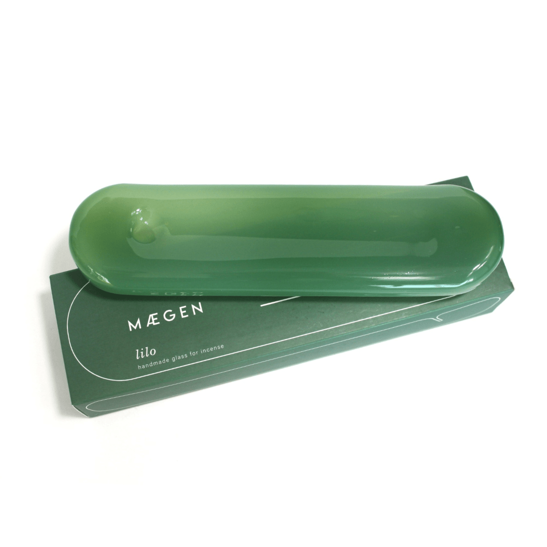 Sea green Lilo incense holder by MÆGEN featuring a modern, sculptural design perfect for holding incense sticks.