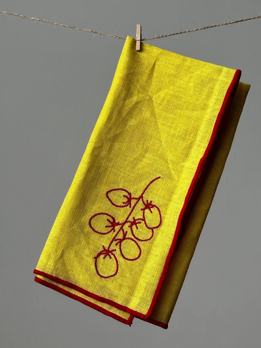 Set of 2 linen blend napkins featuring vine tomato print by MÆGEN, showcasing vibrant, natural fruit-inspired design.
