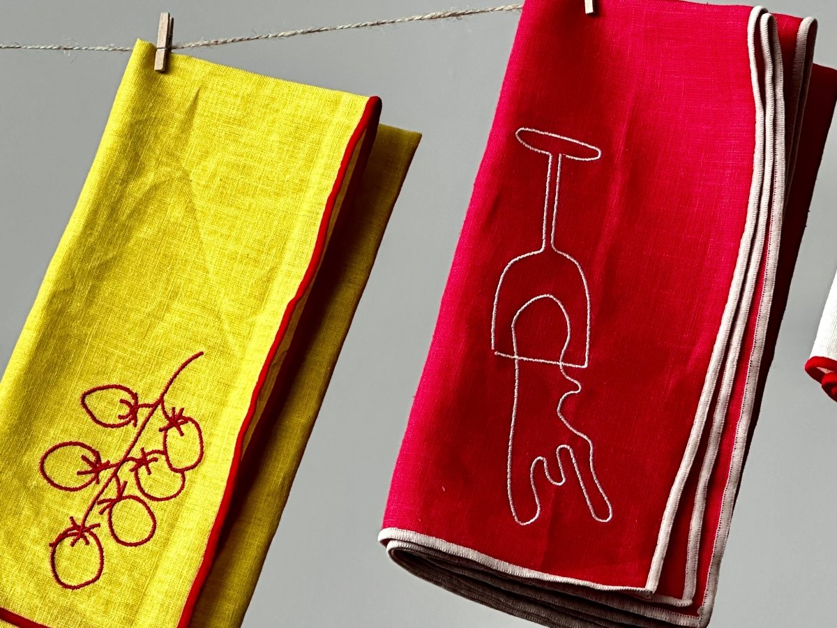 Set of two MÆGEN linen blend napkins featuring vine tomato pattern, perfect for casual dining and table decor.