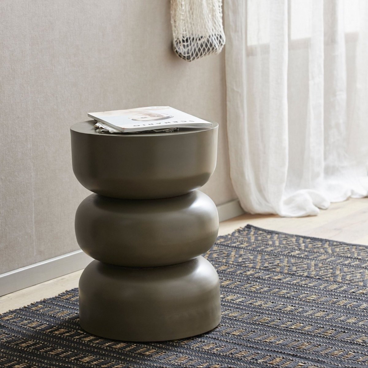 Dark green ALMA side table by Nordal A/S, featuring a sleek modern design and smooth surface, made of durable furniture material.