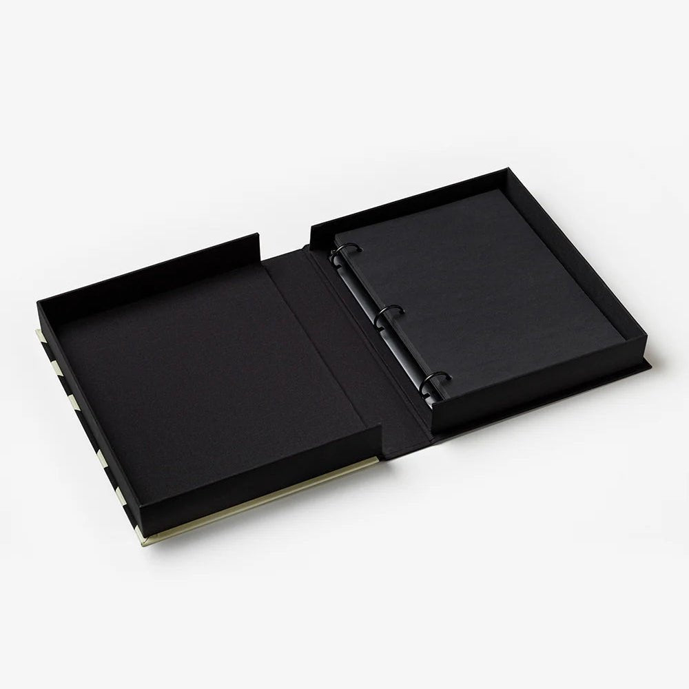 Printworks Good Times photo album with black cover and spiral binding, perfect for storing and displaying cherished photos.