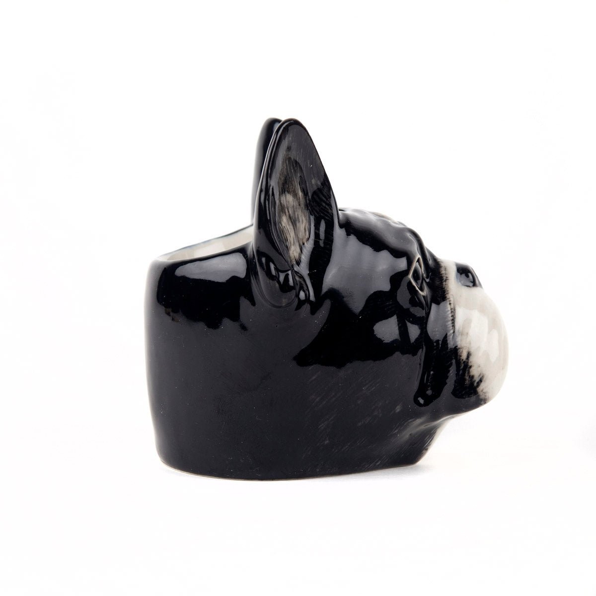 French Bulldog face egg cup by Quail Ceramics, detailed ceramic kitchen accessory featuring a cute dog design.