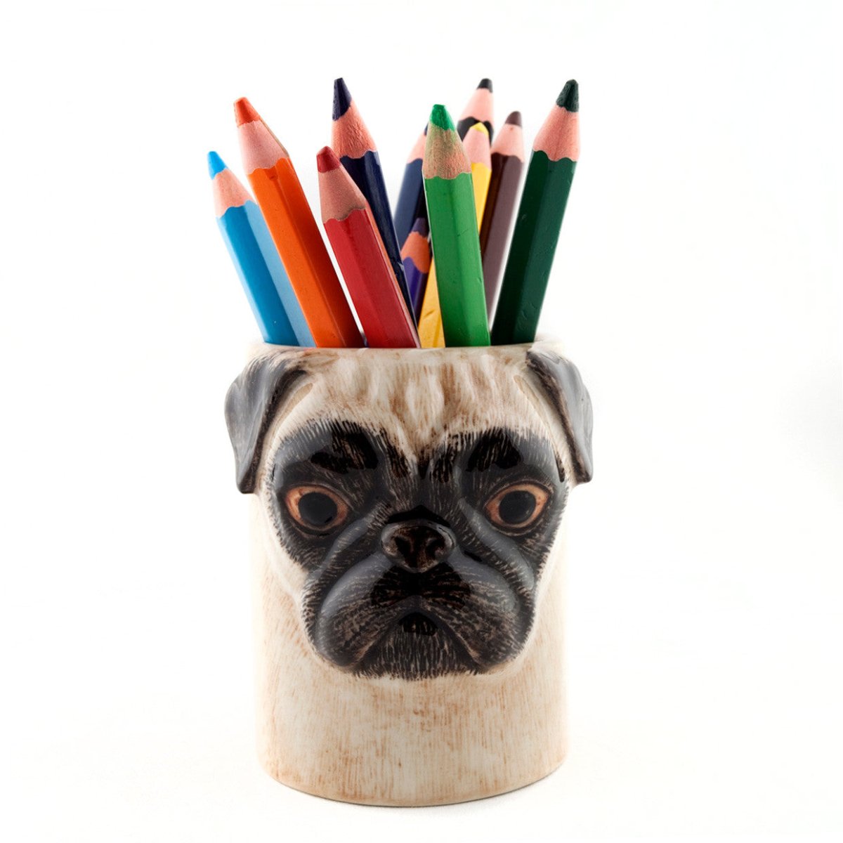 Pencil holder shaped like a pug's head with colorful pencils on a white background