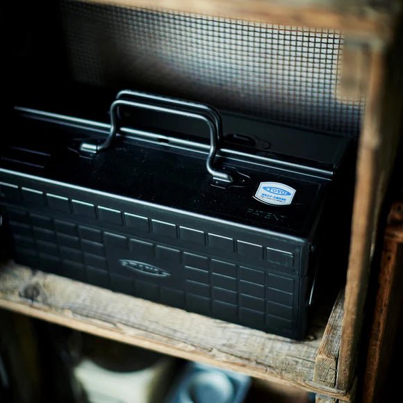 Robinson Two Tier Toolbox ST-350 in black with multiple compartments and sturdy handle, used for organizing tools.