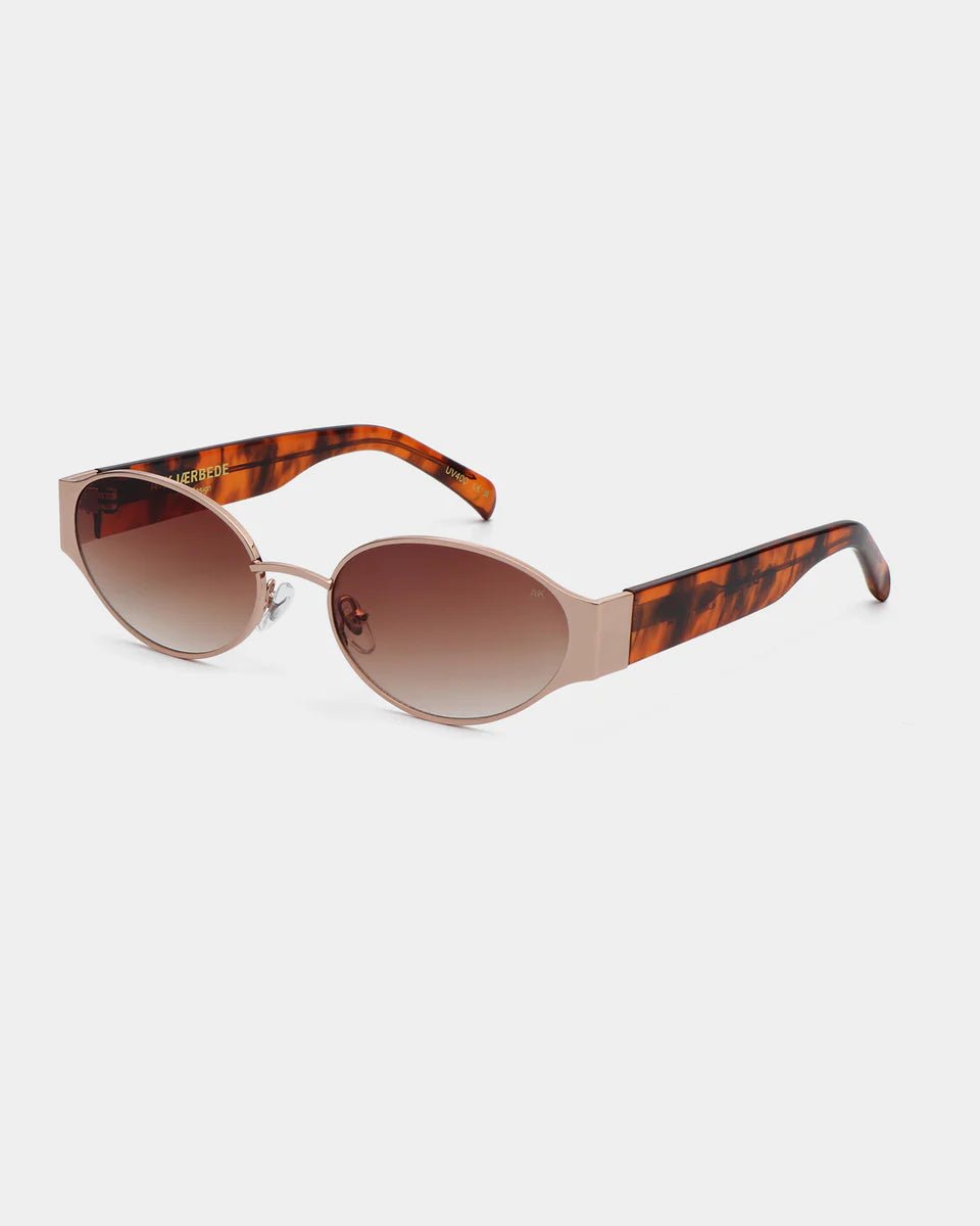 Rosegold Havana Bella sunglasses by A. Kjaerbede with round frames and tinted lenses, stylish and modern eyewear.
