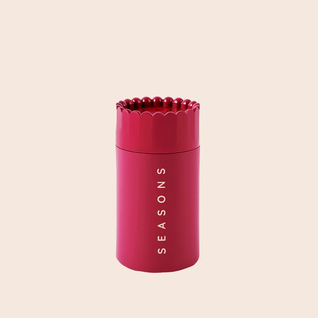 Fuchsia Mini Aero Diffuser by Seasons Life for home use, featuring a sleek design and vibrant color.