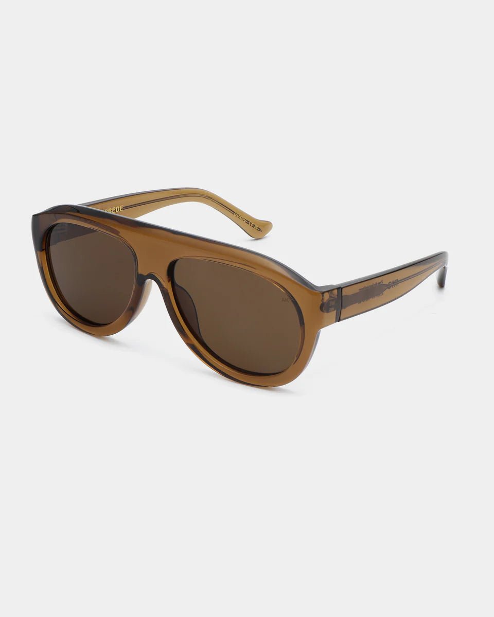 Smoke-transparent Rio sunglasses by A. Kjaerbede featuring a sleek, modern design with tinted lenses and stylish frame.