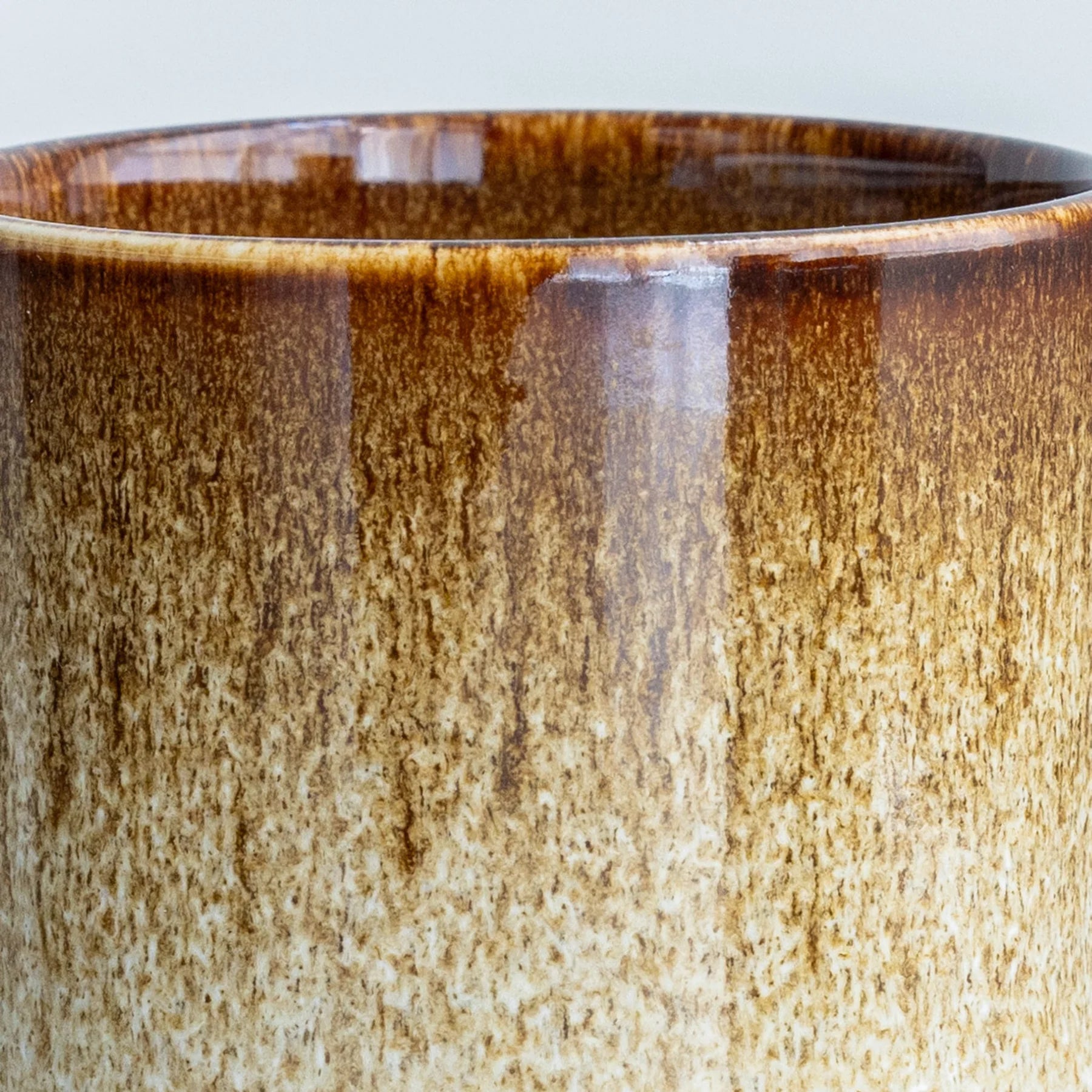 Studio Arhoj ceramic Chocolate Fizz Quench Cup with vibrant glaze and unique design, perfect for enjoying beverages.