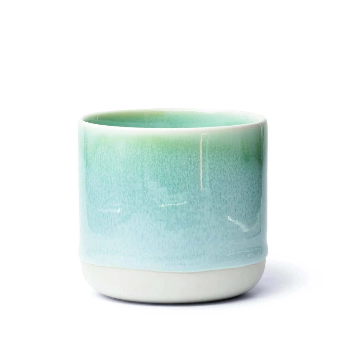 Studio Arhoj Finland Forest Green ceramic Quench Cup with a smooth, glossy finish, showcasing vibrant green color and unique design.