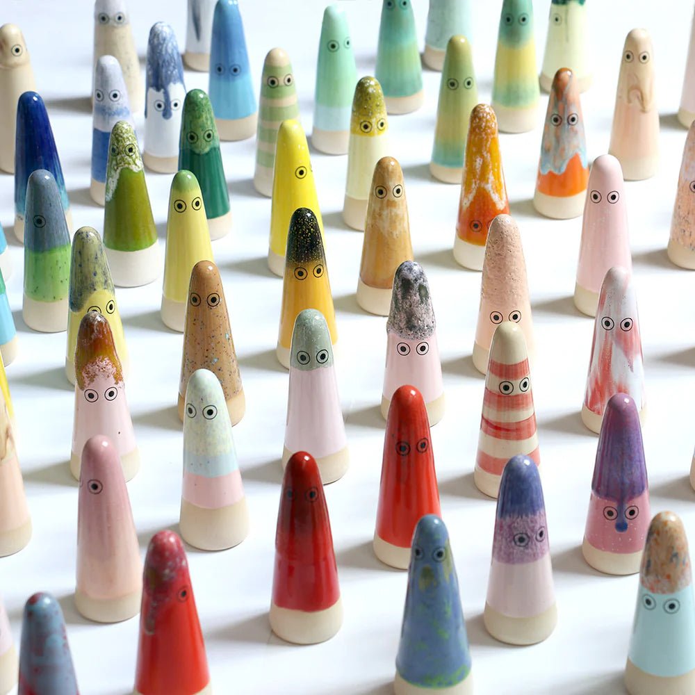 Studio Arhoj ceramic ghost figure with a smooth, glossy finish, showcasing a whimsical and artistic ceramic design.