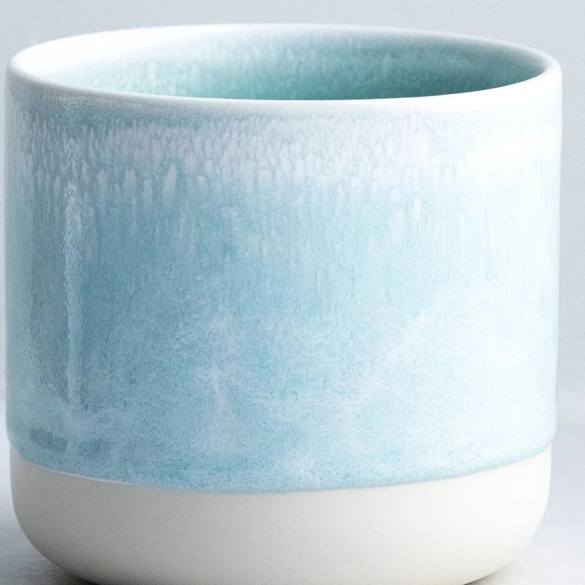 Studio Arhoj ceramic Spearmint Quench Cup featuring a smooth, rounded design and vibrant spearmint green color.