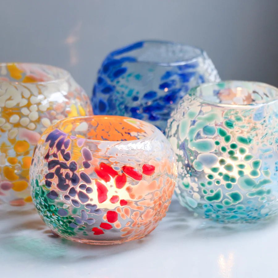 Colorful glass urchin sculpture by Studio Arhoj, featuring vibrant patterns and textured surface, as part of Studio Arhoj glass objects collection.