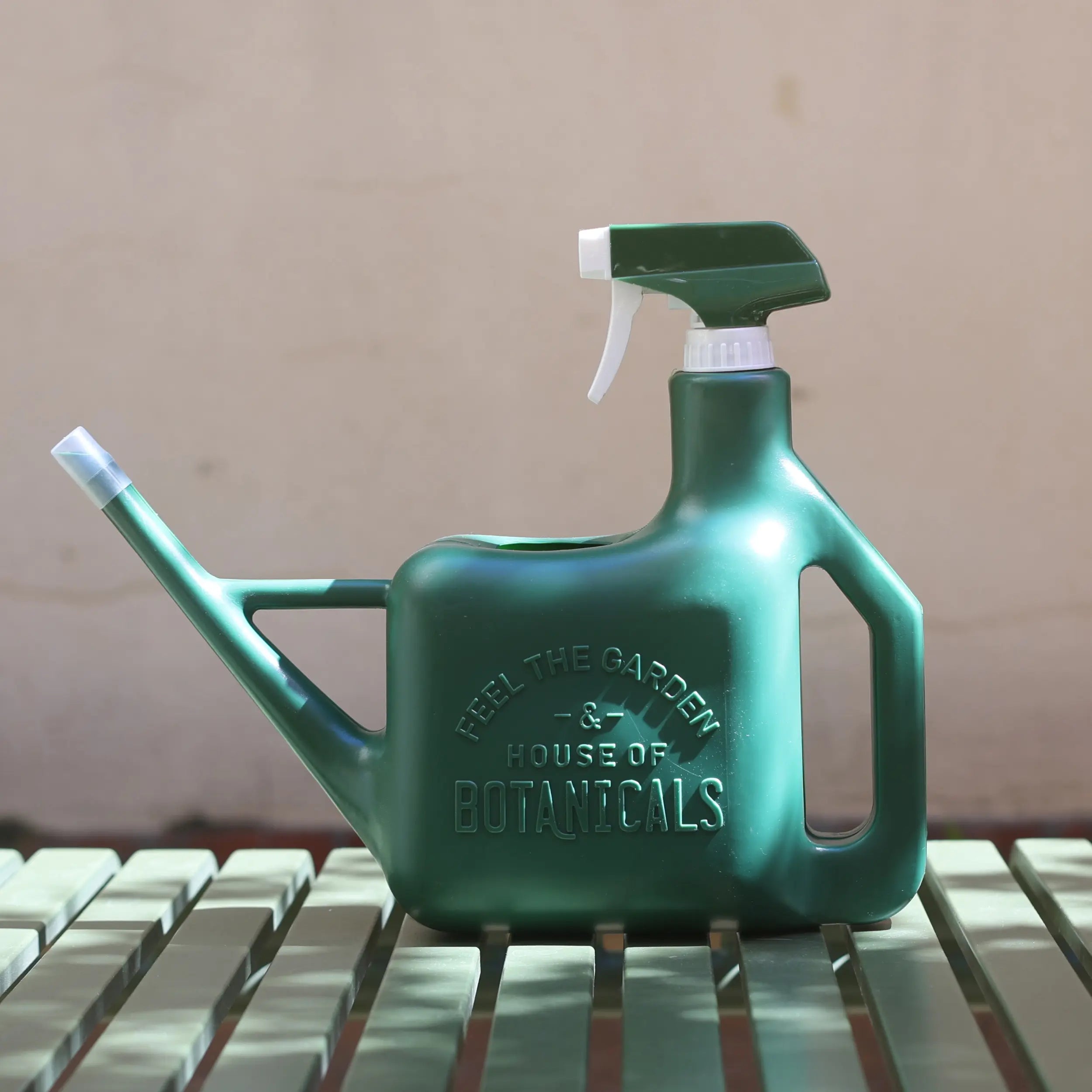 Time Concept Inc gardening spray sprinkler watering can with a metal handle and adjustable nozzle for efficient watering.