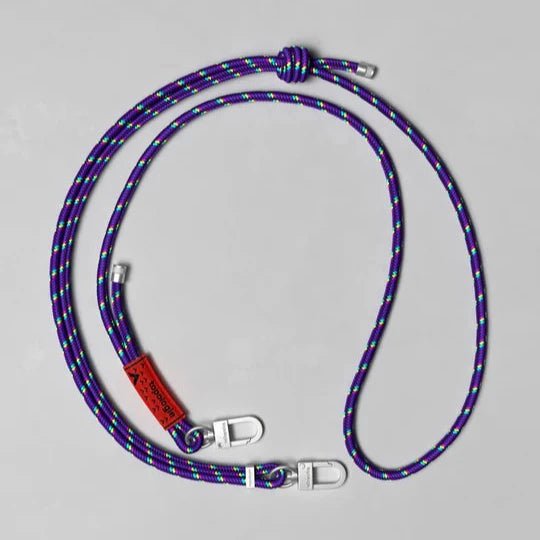 Topologie 6.0mm rope strap showing woven fabric and adjustable metal clasp, designed for securing or carrying items.