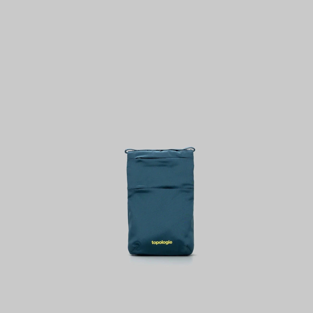 Teal pouch with a brand logo on a gray background