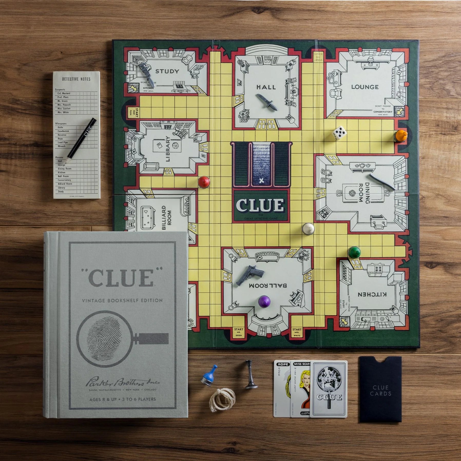 Vintage Bookshelf Edition Clue board game by WS Game Company, featuring classic book-themed game box and components.