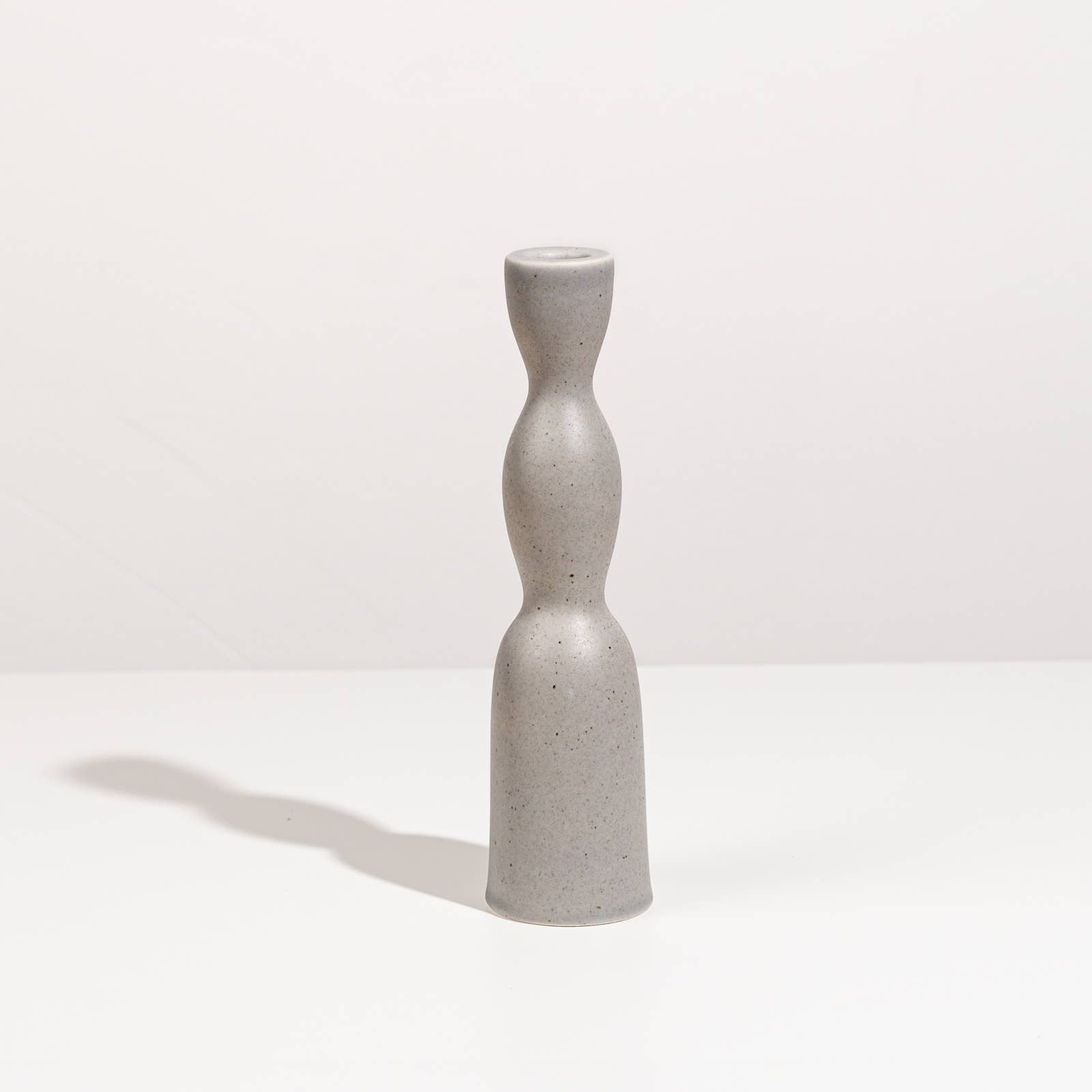Tall grey speckle Wave Candleholder by YOD&CO with a modern, sculptural design suitable for decorative candle display.