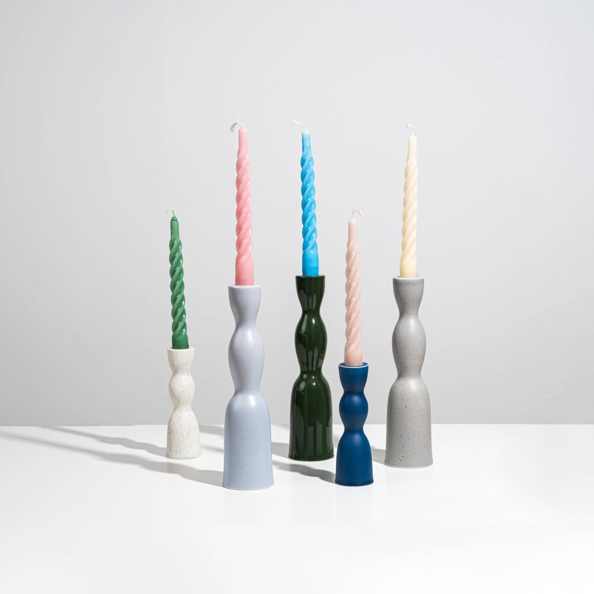 Tall grey speckle Wave Candleholder by YOD&CO, featuring a sleek, modern design perfect for elegant candle displays.