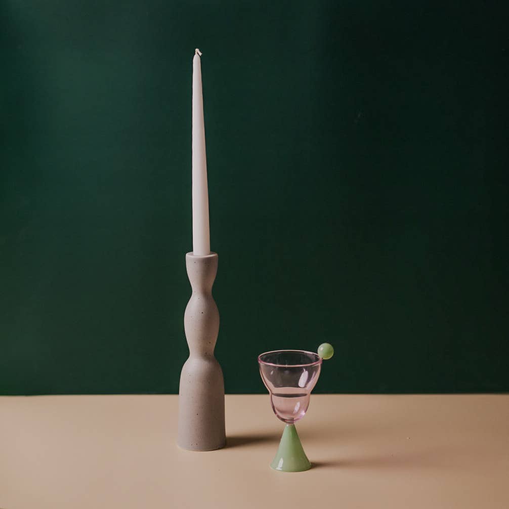 Tall grey speckle Wave Candleholder by YOD&CO featuring a sleek, modern design with a curved shape and smooth finish.