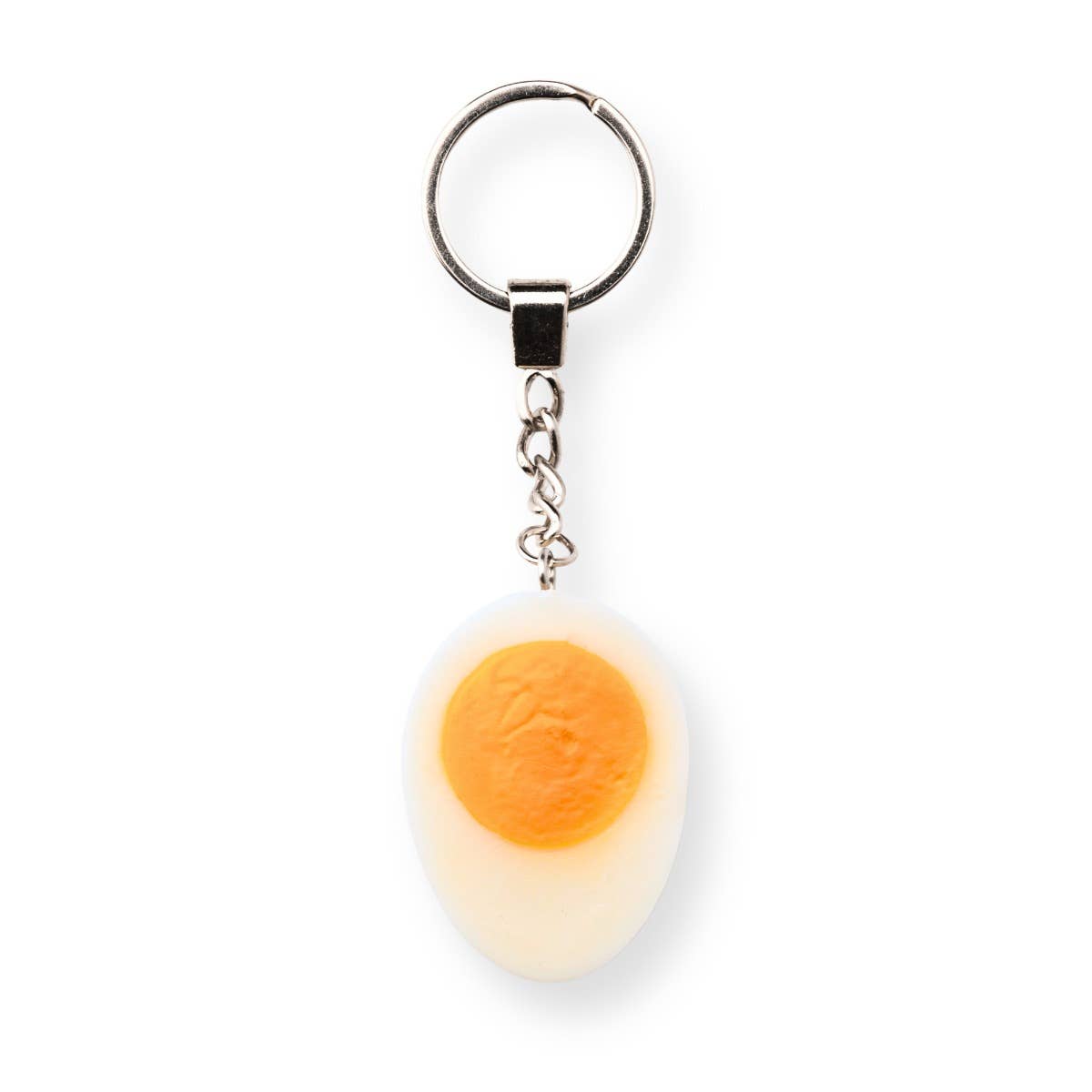 Hard-boiled egg keychain accessory by Yumazing, featuring a realistic soft plastic design and metal keyring attachment.