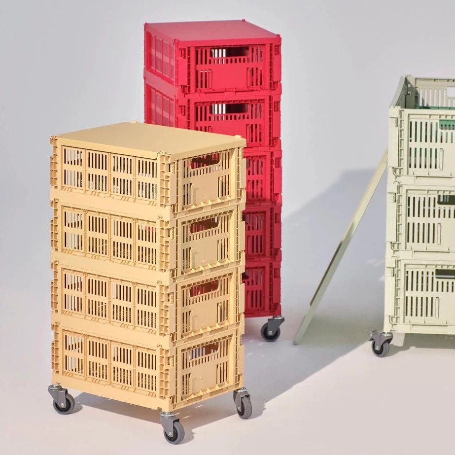 Set of four grey HAY Crate Wheels, durable casters for furniture or storage crates, with sturdy metal frames and smooth rolling wheels.