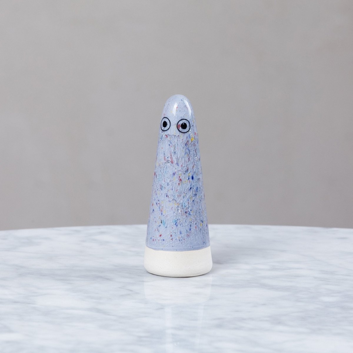 Studio Arhoj ceramic Ghost figure with smooth white glaze and expressive facial features, crafted in a whimsical ghost shape.