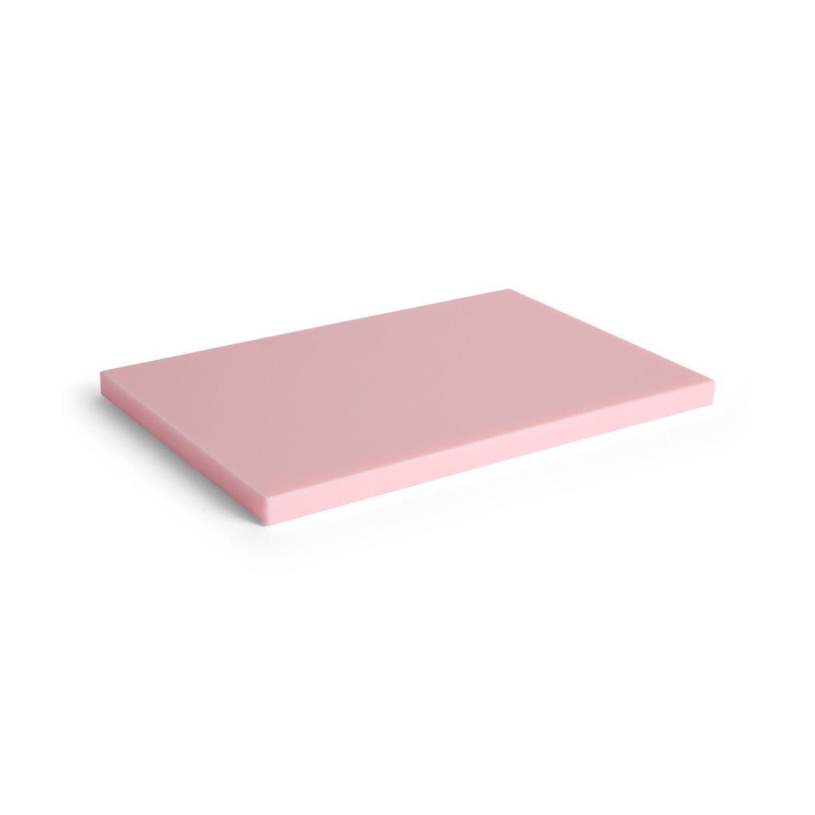 Large pink HAY kitchen chopping board with smooth surface and rounded edges, suitable for food preparation.