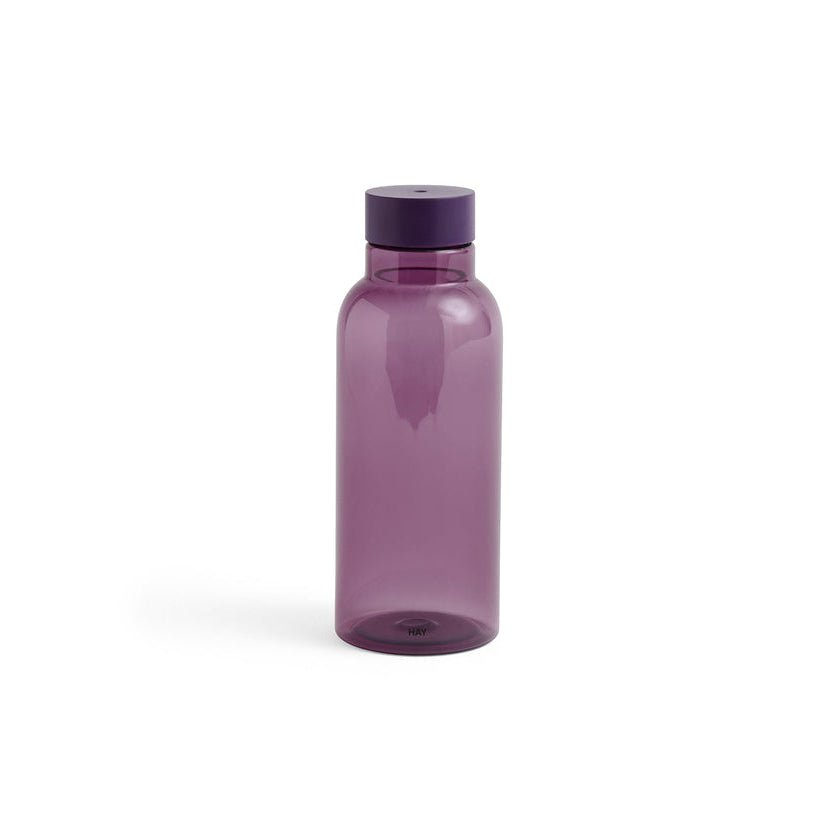Purple water bottle on a white background