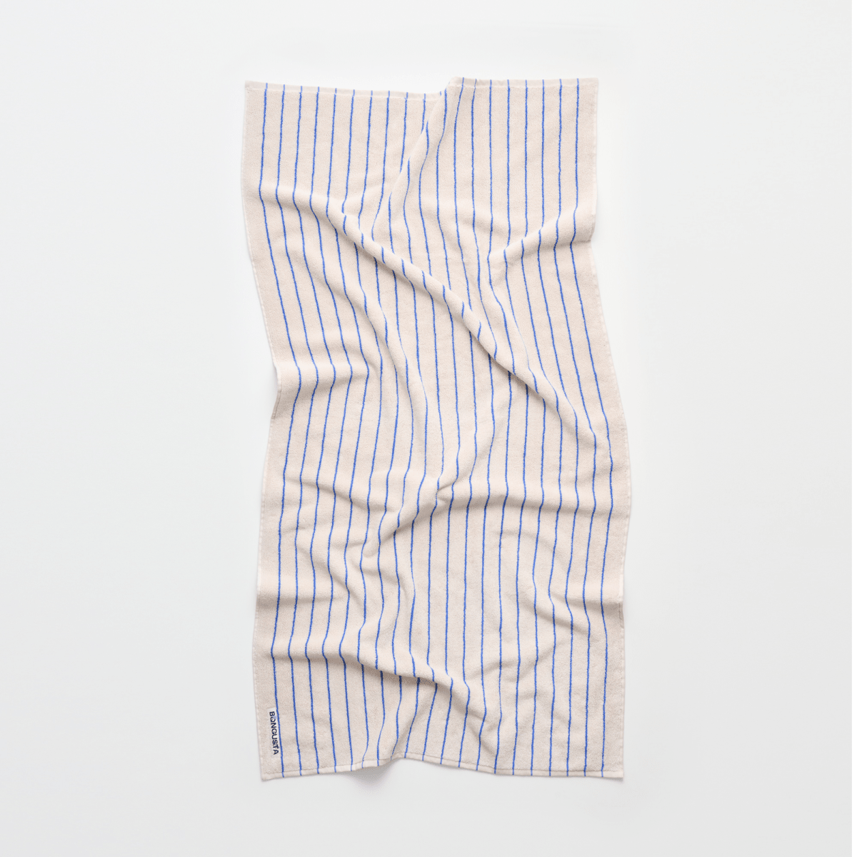 Bongusta Naram bathroom towel in Moonbeam and Ultramarine with soft, plush fabric and modern design.