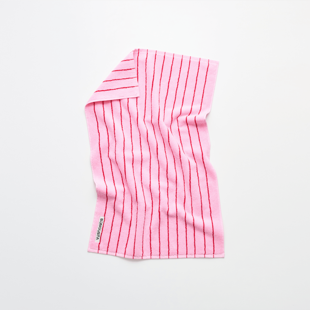 Baby pink and ski patrol bathroom hand towel from Bongusta with soft, absorbent fabric and stylish design.