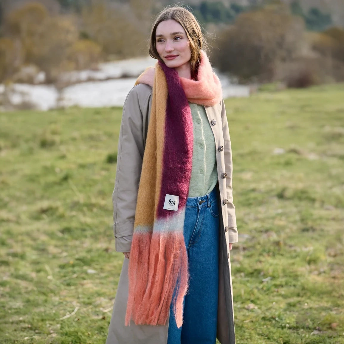 Views Mohair Scarf by 814 Ezcaray, a soft beige accessory with a cozy, lightweight knit, perfect for stylish winter layering.